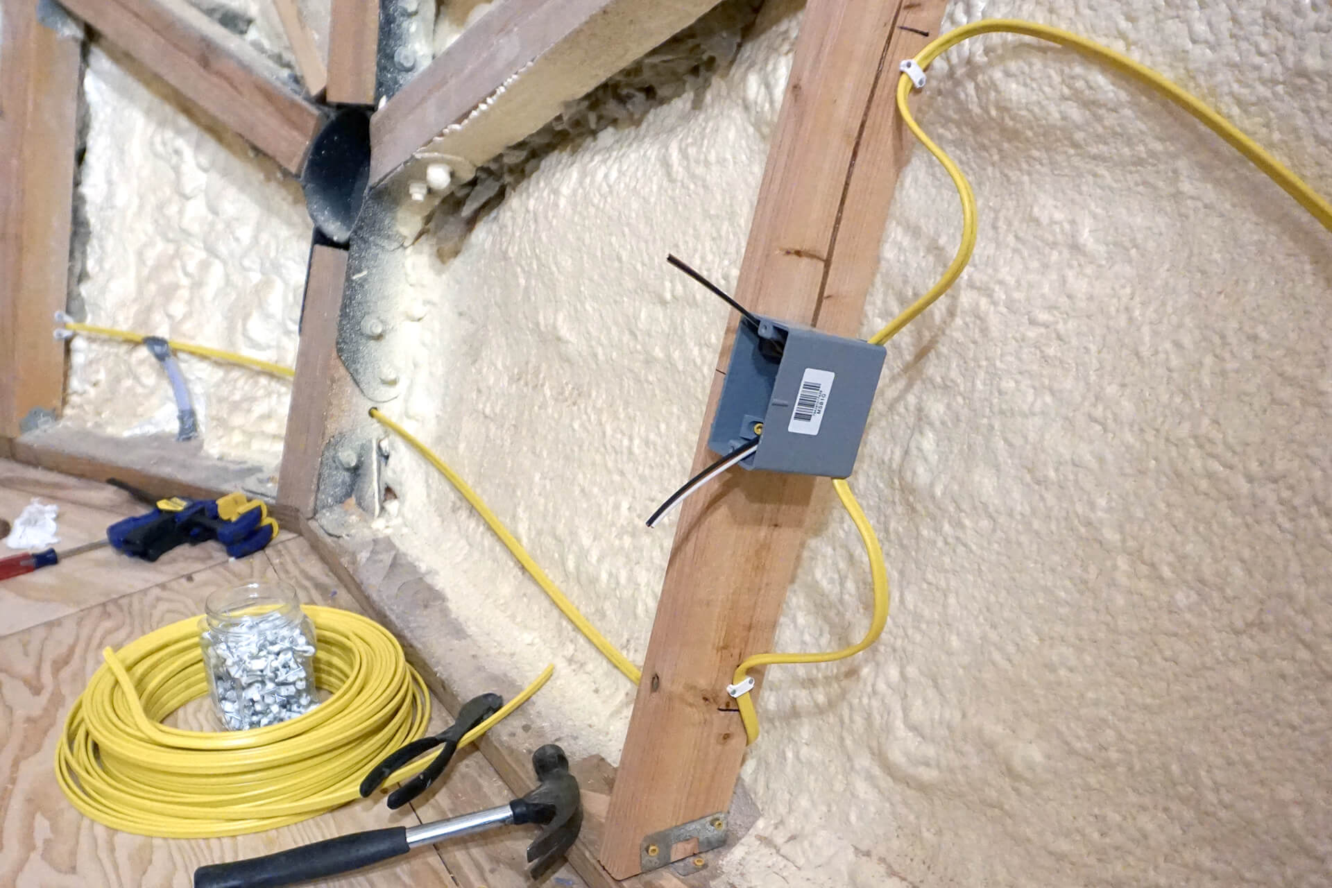 Installing the electrical in the geodesic dome.