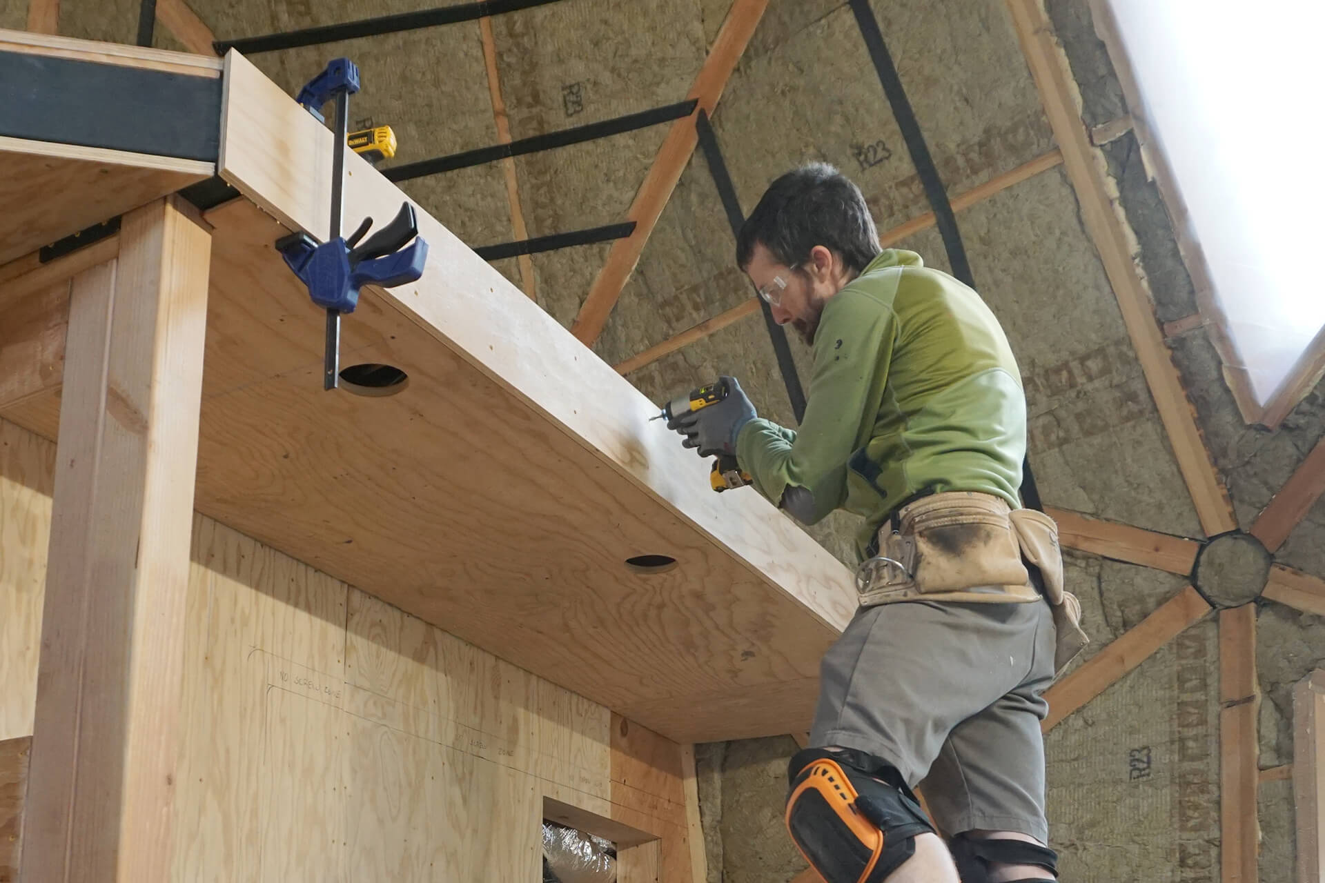 Installing wooden trim.