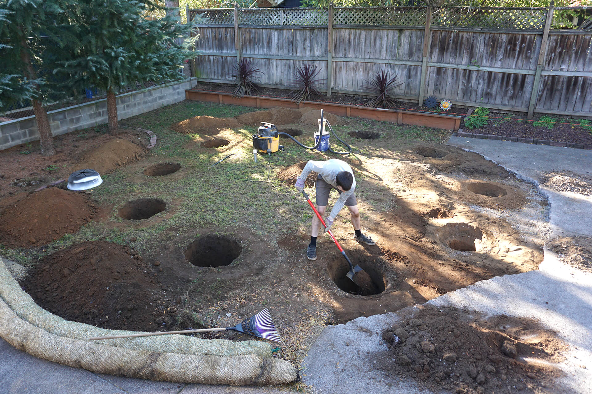 Digging foundation holes.