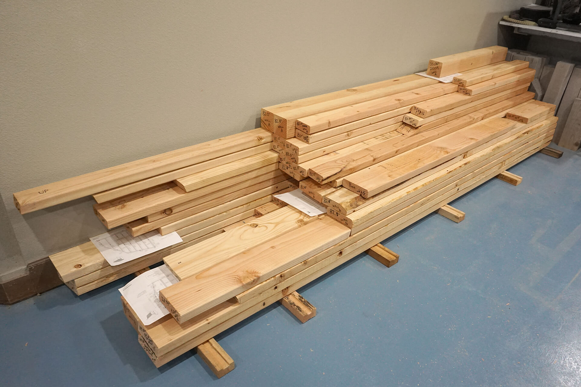 A stack of prefabricated room lumber.