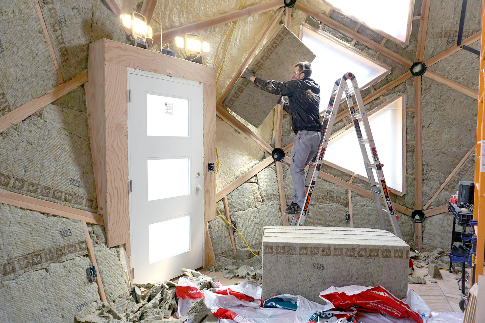 Installing the soft insulation.